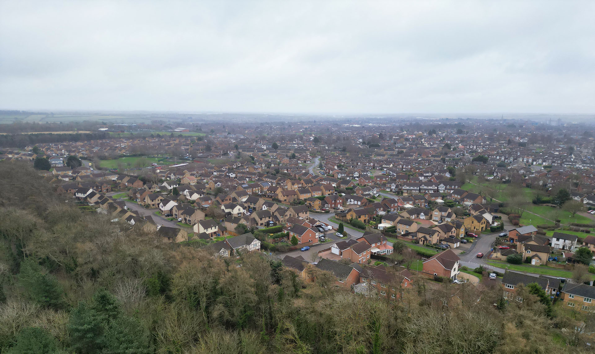 Commercial Pest Control in Corby this is an aerial shot of Corby Town on a grey winter's day