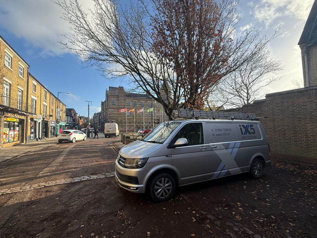 contact iX5 Pest control Rugby, this inmage shows one of our vans parked in Rugby