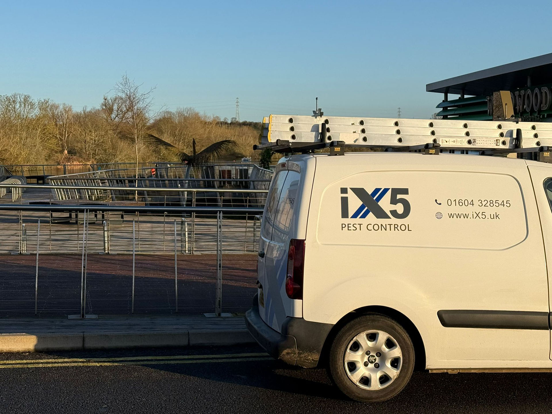 iX5 Pest Control commercial van at Rushden Lakes providing business pest control services in Rushden