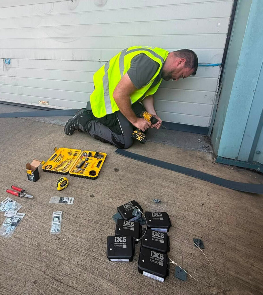 iX5 Pest Control technician carrying out pest proofing works at a commercial premises