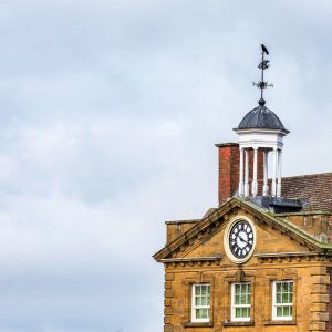 Commercial Pest Control in Daventry image shows The Moot Hall building roof in Daventry town centre