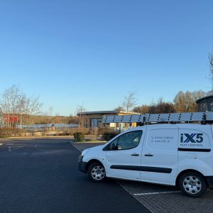 iX5 Pest Control service vehicle parked at Rushden Lakes shopping and leisure complex in Rushden